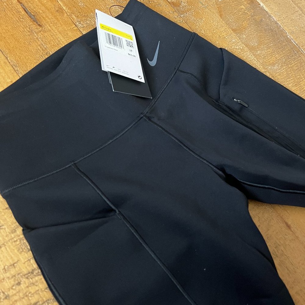 Nike Go Women's Firm-Support Mid-Rise 8" Biker Shorts with Pockets - SM